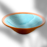 kleine Keramikschüssel innen türkis außen braun leicht abgeflacht